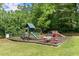 Fun playground area with swings, slides, and climbing equipment, ideal for outdoor Gathering activities at 1172 Malvern Hunt Ct, Lawrenceville, GA 30043
