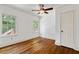 Bright bedroom with hardwood floors and a ceiling fan at 131 Lively St, Norcross, GA 30071