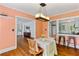 Inviting dining room with hardwood floors, and modern lighting at 131 Lively St, Norcross, GA 30071