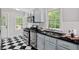 Well-equipped kitchen with stainless steel appliances and checkerboard flooring at 131 Lively St, Norcross, GA 30071