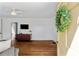 Bright living room featuring hardwood floors and a decorative wreath on the front door at 131 Lively St, Norcross, GA 30071