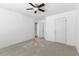 Bedroom featuring neutral walls, carpet, and a ceiling fan at 1310 Scenic View Trce, Lawrenceville, GA 30044