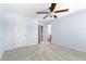 Bedroom featuring neutral walls, carpet, and a ceiling fan at 1310 Scenic View Trce, Lawrenceville, GA 30044