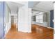 Open-concept space with hardwood floors, fresh paint and detailed trim work at 1310 Scenic View Trce, Lawrenceville, GA 30044