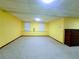 Finished basement with neutral carpet, painted walls, a window, and closet for ample space at 4503 Hunters Ter, Stone Mountain, GA 30083