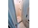 Inside the shower featuring tile surround at 4503 Hunters Ter, Stone Mountain, GA 30083