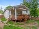 Exterior rear view of a home with a brown deck at 2100 Rockies Ct, Norcross, GA 30071
