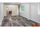 Bedroom featuring a built-in wardrobe with ample storage and a window view at 2100 Rockies Ct, Norcross, GA 30071
