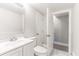 Bathroom with modern vanity and doorway leading to another room at 3017 Tribble Ln, Atlanta, GA 30311