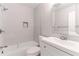 Modern bathroom with subway tile shower, bathtub, and sleek vanity at 3017 Tribble Ln, Atlanta, GA 30311