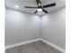 Cozy bedroom with wood floors, ceiling fan, and neutral paint at 3017 Tribble Ln, Atlanta, GA 30311