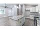Modern kitchen featuring granite countertops, a kitchen island, stainless steel appliances, and recessed lighting at 3017 Tribble Ln, Atlanta, GA 30311