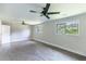 Bright living room with ceiling fans and backyard view at 3017 Tribble Ln, Atlanta, GA 30311