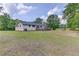 Spacious backyard with a deck, offering plenty of room for outdoor activities at 3600 Anglin Rd, Loganville, GA 30052