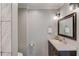 Updated bathroom features granite countertop, modern fixtures, and great lighting at 3600 Anglin Rd, Loganville, GA 30052
