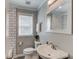 Bright bathroom with modern fixtures, white subway tile, and vanity with granite countertop at 3600 Anglin Rd, Loganville, GA 30052