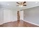 Spacious bedroom with ceiling fan, ensuite bathroom, walk in closet and hardwood floors at 3600 Anglin Rd, Loganville, GA 30052