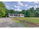 Charming home with a well-manicured lawn and inviting curb appeal in a serene setting at 3600 Anglin Rd, Loganville, GA 30052