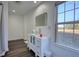 Bathroom featuring modern vanity and fixtures with an exterior view at 4180 Mount Paran Dr, Social Circle, GA 30025