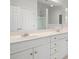 Primary bathroom with dual sink vanity, white cabinets, and separate shower at 45 Waterloo Ct, Hiram, GA 30141