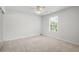 Bedroom with neutral carpet, fan and a window providing natural light at 45 Waterloo Ct, Hiram, GA 30141