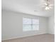 Bedroom with neutral paint, carpet, and ceiling fan at 45 Waterloo Ct, Hiram, GA 30141