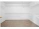 Spacious walk-in closet with carpet and wire shelving, ready for storage and organization at 45 Waterloo Ct, Hiram, GA 30141