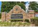 Stone entrance sign for Highland Point at Waterford Park, framed by greenery, offering a welcoming introduction to the neighborhood at 45 Waterloo Ct, Hiram, GA 30141
