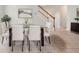Dining room with a glass table, rug, and modern decor at 45 Waterloo Ct, Hiram, GA 30141