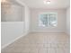 Spacious and neutral living room featuring large bright windows at 45 Waterloo Ct, Hiram, GA 30141