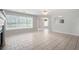 Bright open-plan living room with large windows at 45 Waterloo Ct, Hiram, GA 30141