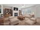 Cozy living room with fireplace, bookshelves, and comfortable seating at 45 Waterloo Ct, Hiram, GA 30141