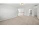 This spacious loft area includes new carpet, a bathroom, and bedrooms nearby at 45 Waterloo Ct, Hiram, GA 30141