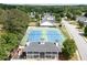 Aerial view of community tennis courts with a playground and community pool nearby at 45 Waterloo Ct, Hiram, GA 30141