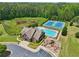 Community amenities include a pool, playground, and tennis courts surrounded by lush greenery at 1136 Garner Creek At Parkview Sw Dr, Lilburn, GA 30047