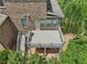 Birds eye view of the back deck with stairs and railing overlooking the yard at 1136 Garner Creek At Parkview Sw Dr, Lilburn, GA 30047