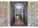 Grand foyer featuring hardwood floors and an ornate, arched doorway at 1136 Garner Creek At Parkview Sw Dr, Lilburn, GA 30047