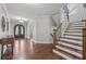Welcoming foyer with staircase and views of the front door at 1136 Garner Creek At Parkview Sw Dr, Lilburn, GA 30047