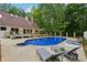 Enjoy the spacious backyard with a large pool and plenty of room for entertaining at 400 N Peachtree Pkwy, Peachtree City, GA 30269