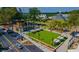 An aerial view showcases a vibrant outdoor space featuring well-maintained landscaping, seating areas, and walkways at 4109 Abbotts Bridge Rd, Duluth, GA 30097
