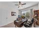 Bright home office with functional desk, neutral colors and natural light at 704 Woodbridge Dr, Woodstock, GA 30188