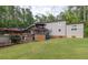 The back of the house features a cozy gazebo and multiple decks with an expansive yard at 814 Clarke Trl, Dacula, GA 30019