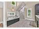 Bright bathroom with a soaking tub, shower, and window that provides natural light at 814 Clarke Trl, Dacula, GA 30019