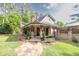 Inviting front porch with stone path, rocking chairs, and craftsman-style details at 814 Clarke Trl, Dacula, GA 30019