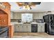Bright kitchen with stainless steel appliances, updated countertops, and an undermount sink at 814 Clarke Trl, Dacula, GA 30019