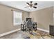 Home office featuring a desk with a computer setup, creating a functional and productive workspace at 814 Clarke Trl, Dacula, GA 30019