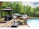 Enjoy outdoor living with a pool and gazebo in your backyard at 814 Clarke Trl, Dacula, GA 30019