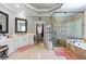 Bathroom featuring soaking tub and glass enclosed shower at 1029 Laurel Grove Cts, Suwanee, GA 30024