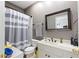 Practical bathroom includes a tub/shower combination and simple decor at 1029 Laurel Grove Cts, Suwanee, GA 30024