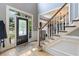 Bright foyer with hardwood floors, staircase, and a stylish front door at 1029 Laurel Grove Cts, Suwanee, GA 30024